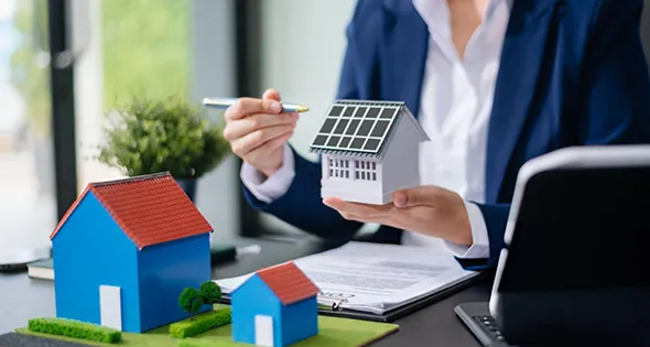 Sun shining on installed solar panels for residential energy in Portland, ME